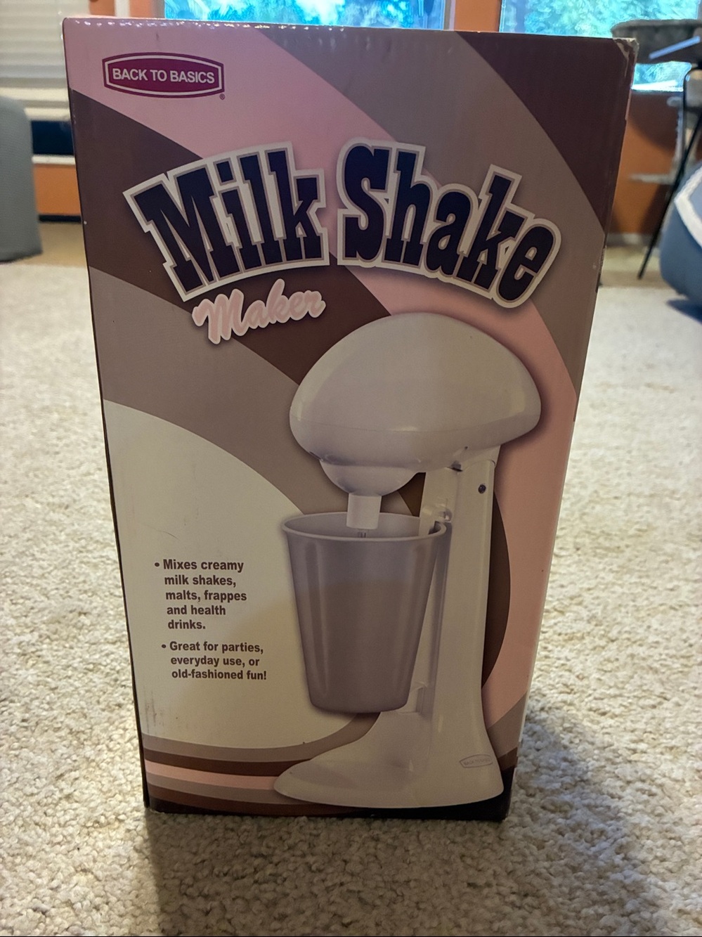 Milkshake Maker handheld stand mixer. Color white.